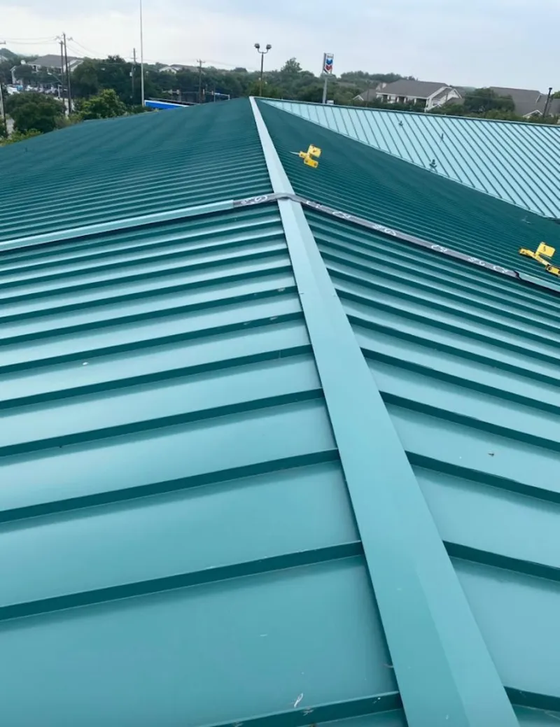 Green commercial metal roof ridge and valley for Metal Roof Repair in Dunmore
